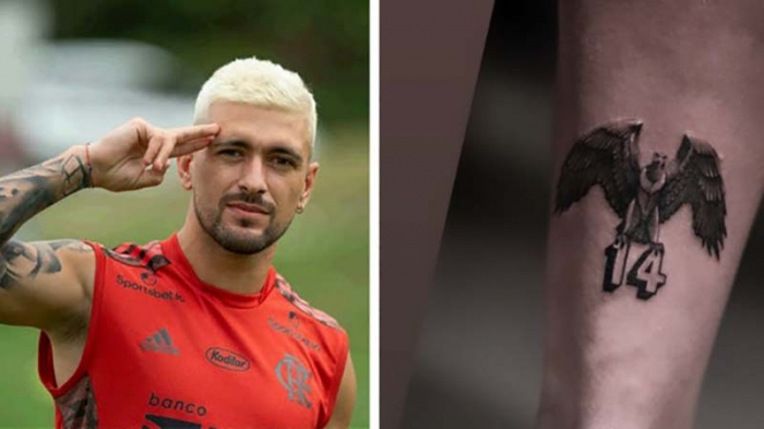 Arrascaeta eterniza Flamengo com tatuagem de urubu e número 14